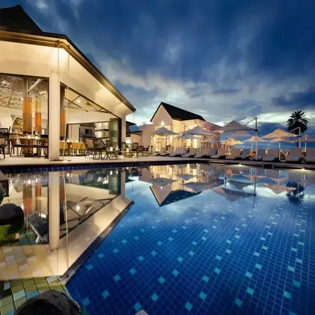 The poolside bar at dusk