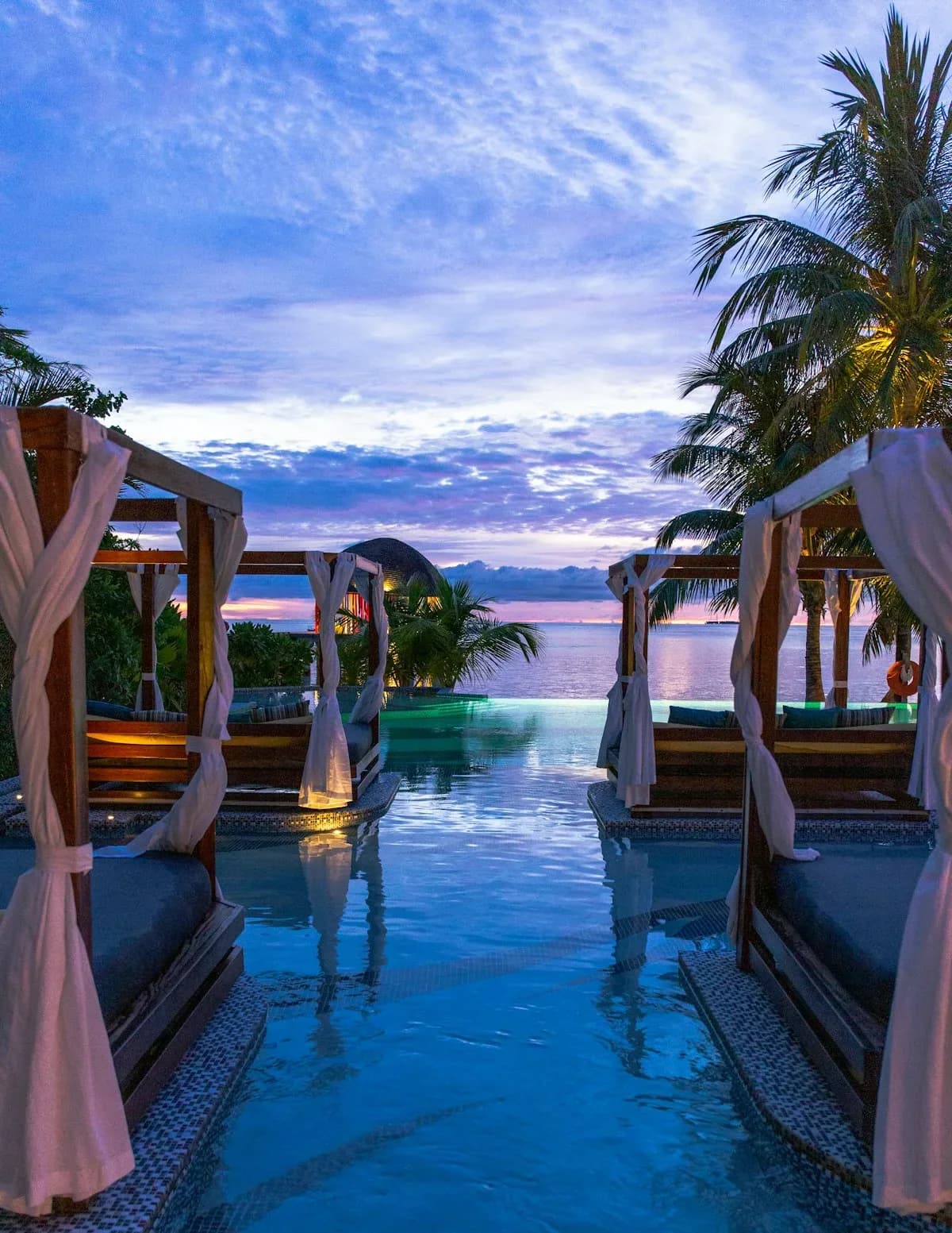 The sea-edge infinity pool at golden hour